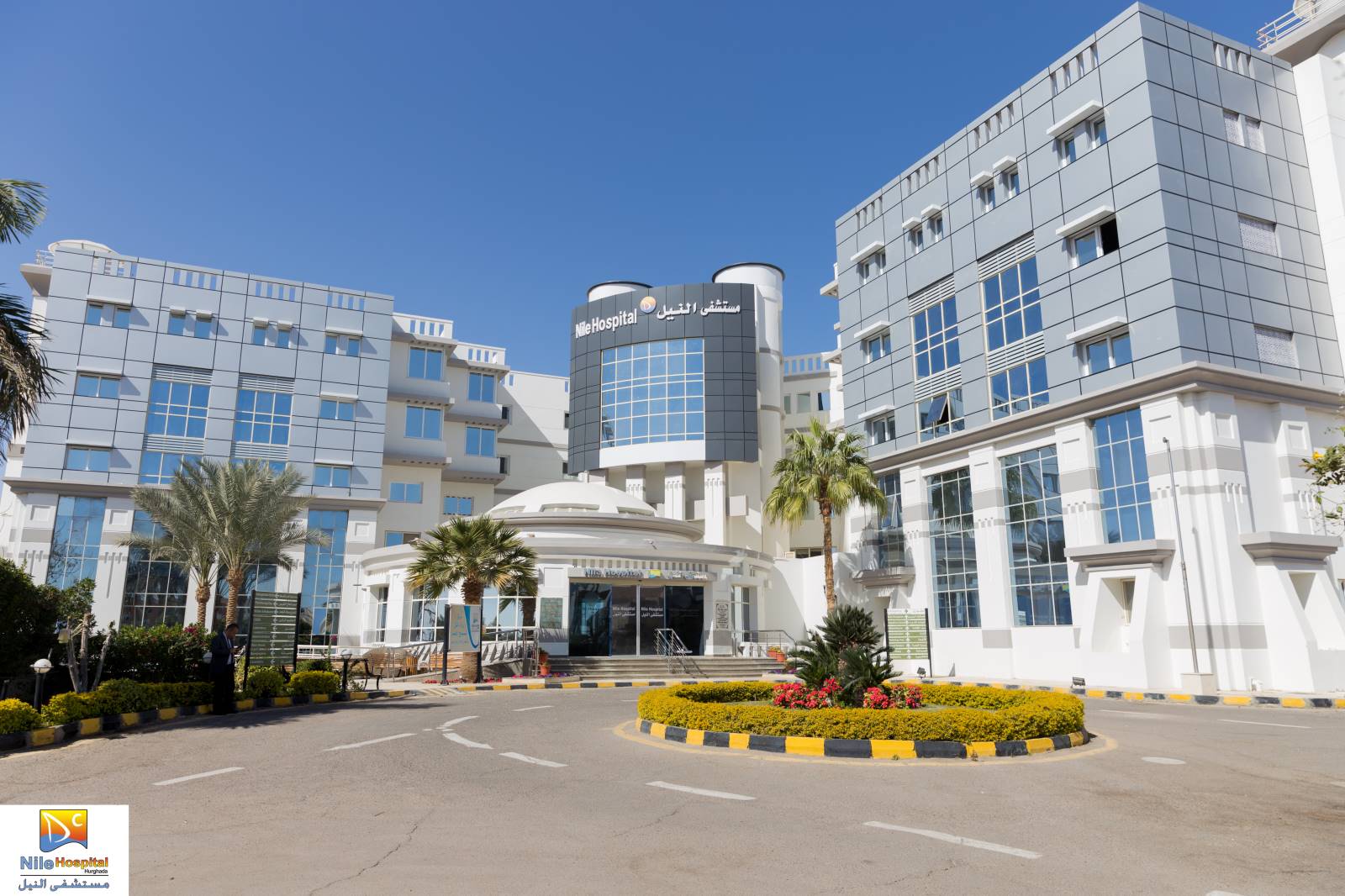 Exterior of Nile Hospital in Hurghada with entrance driveway and hospital signage